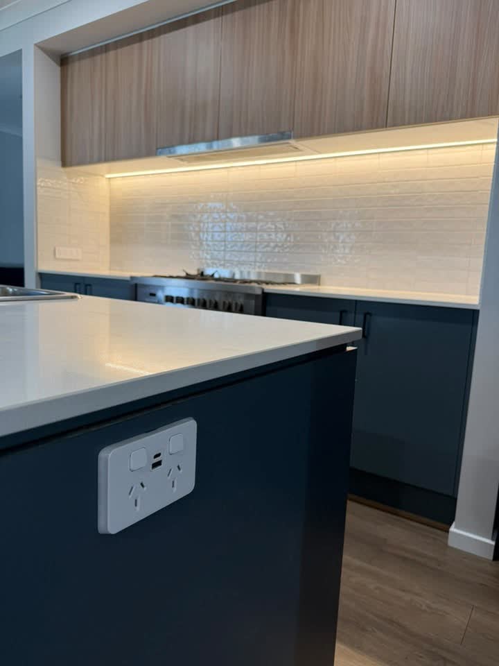 Quad power point with USB-C charging installed on a kitchen island bench